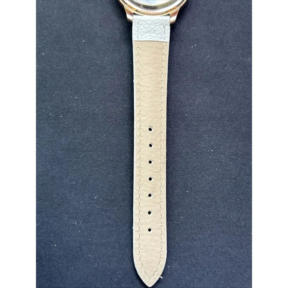 Rose Gold Tone White Dial And Band Women’s Quartz Watch